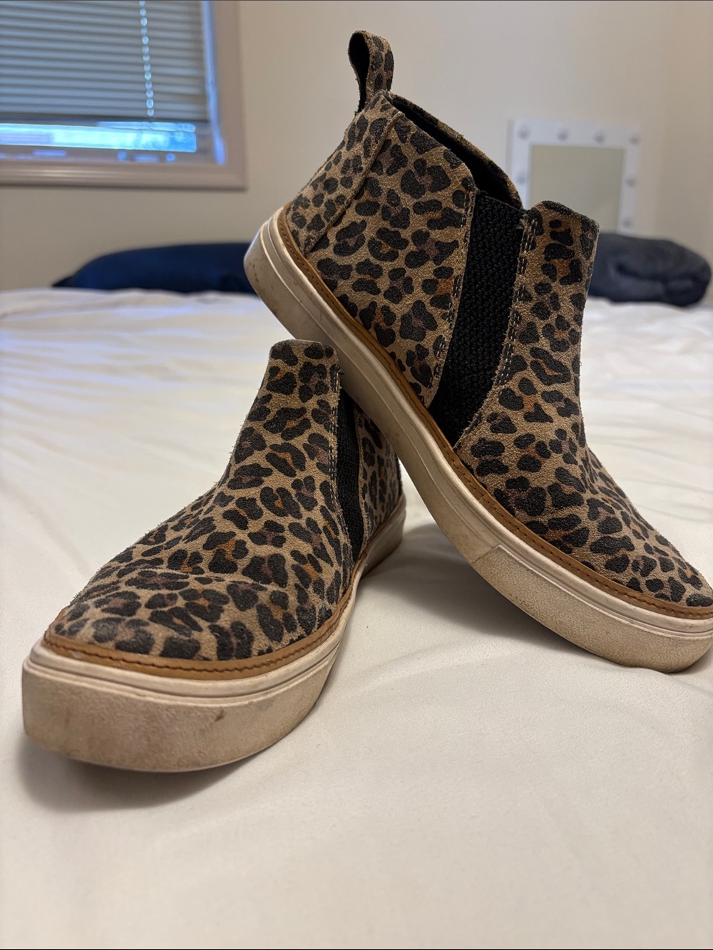 Toms Leopard Print Slip-On Sneakers in Brown and Black